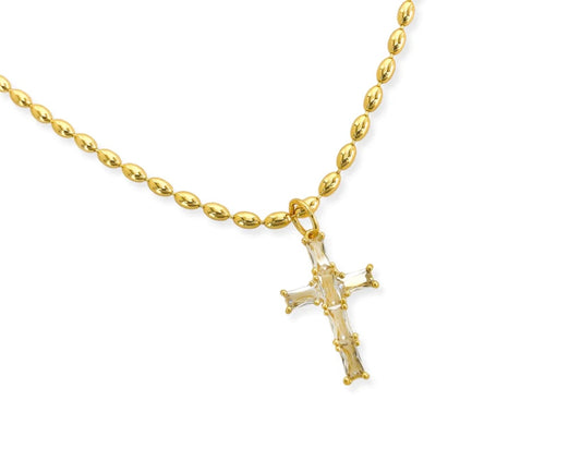 Pendant necklace: "Gold plated necklace with cubic zirconia cross pendant."