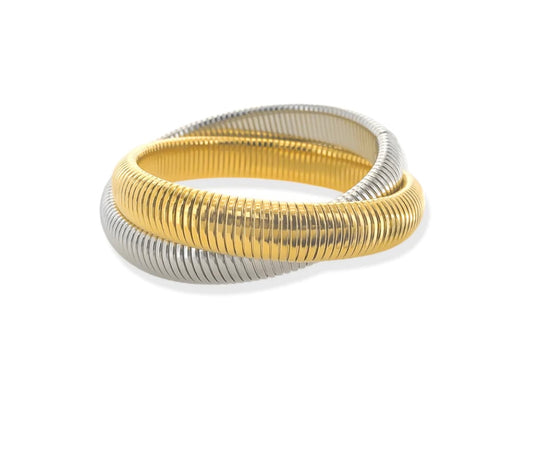 Semi-stretch cobra ribbed bracelet: Gold and rhodium plated stainless steel bracelet with cobra ribbed design.