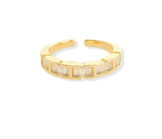 Baguette cubic zirconia statement ring: Gold and rhodium plated ring with radiant baguette cubic zirconia stones.